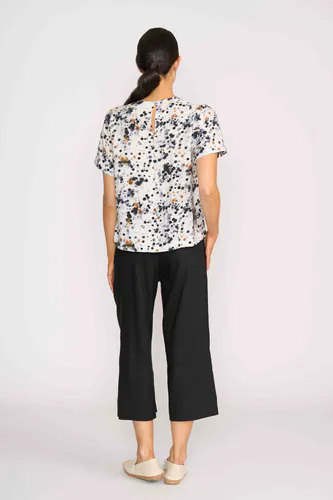 Model wearing Artful Pleat Neck Top By Foil Available at Beetees Nelson